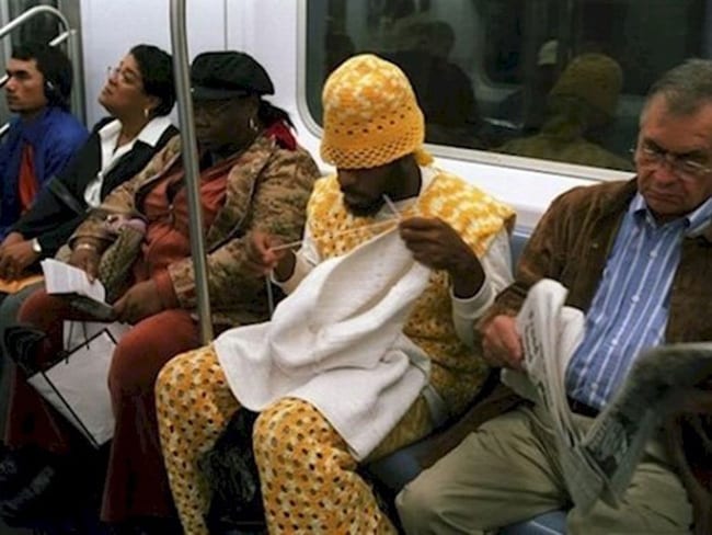 Knitting Fanatic Relaxes On The Subway