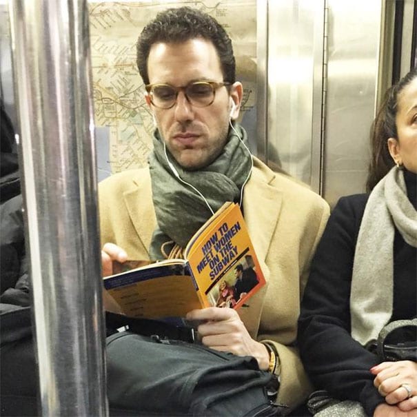 Man Reads A Book About The Subway... On The Subway