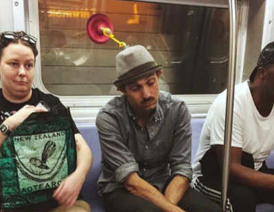 Creative Way To Nap On The Subway
