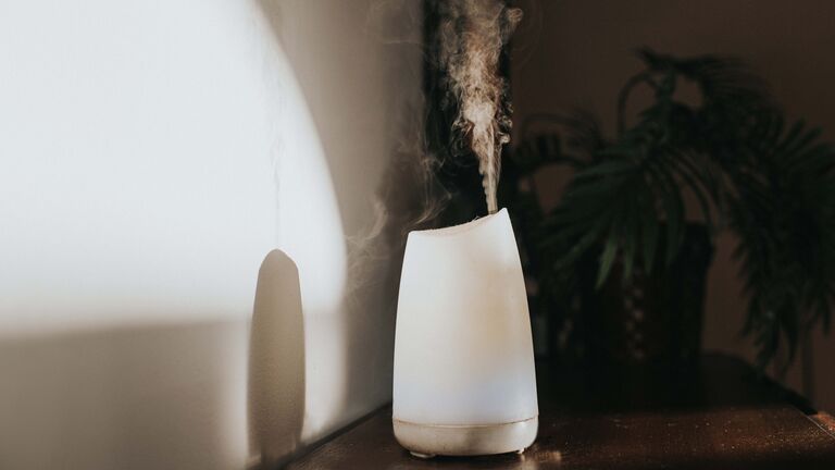 A White Oil Diffuser / Humidifier In A Domestic Setting